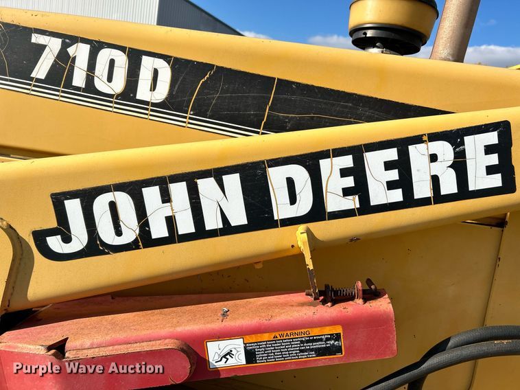 image for item NR9317 1997 John Deere 710D  backhoe