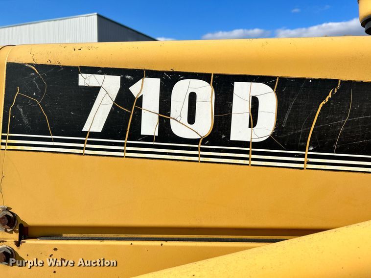 image for item NR9317 1997 John Deere 710D  backhoe