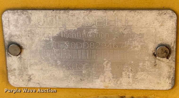 image for item NR9317 1997 John Deere 710D  backhoe