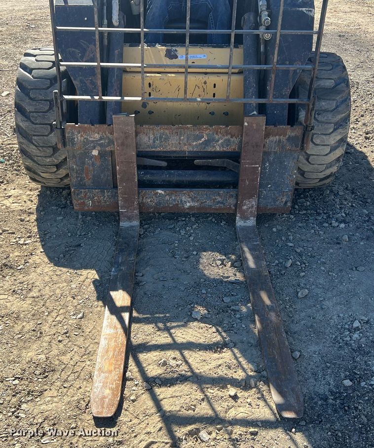 image for item OA9019 1996 New Holland LX885  skid steer loader