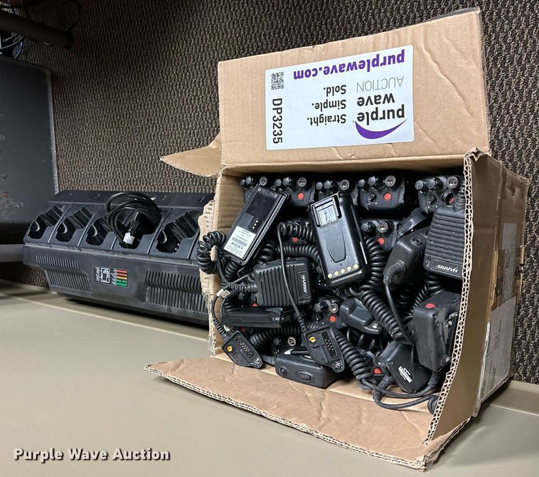 image for item DP3235 Approximately (22) Harris P7300 hand held two-way radios with speaker  mics