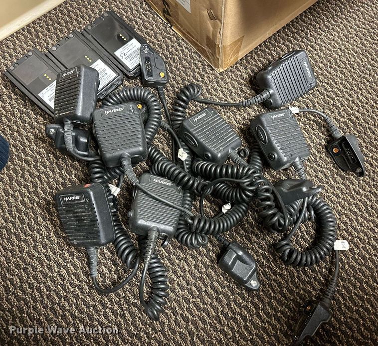 image for item DP3235 Approximately (22) Harris P7300 hand held two-way radios with speaker  mics