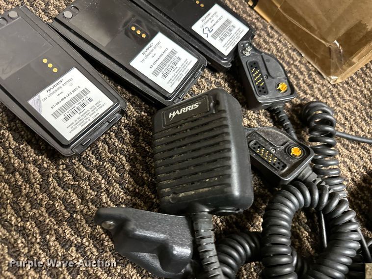 image for item DP3235 Approximately (22) Harris P7300 hand held two-way radios with speaker  mics