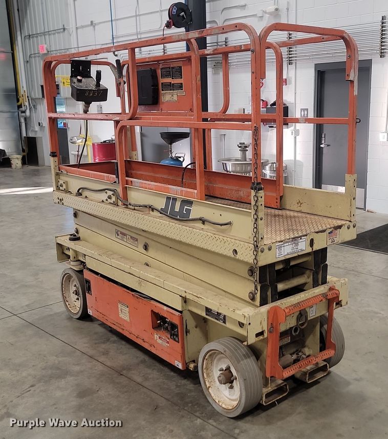 image for item KH9434 1999 JLG 2033-E  scissor lift