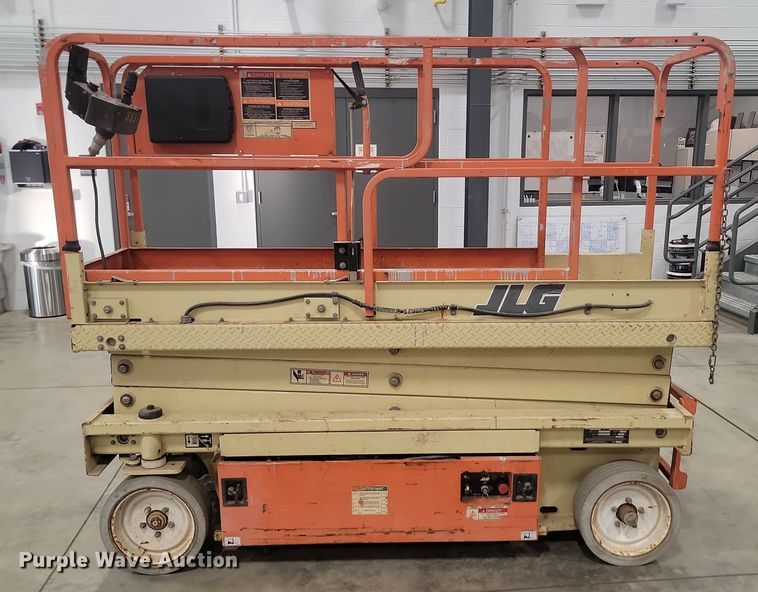 image for item KH9434 1999 JLG 2033-E  scissor lift
