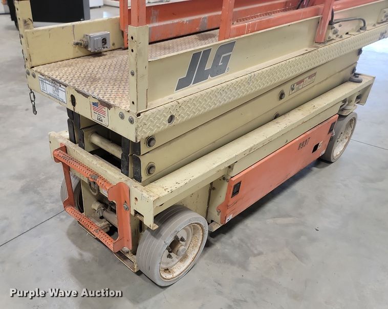image for item KH9434 1999 JLG 2033-E  scissor lift
