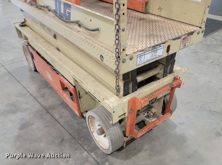 image for item KH9434 1999 JLG 2033-E  scissor lift