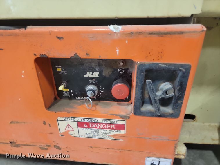 image for item KH9434 1999 JLG 2033-E  scissor lift