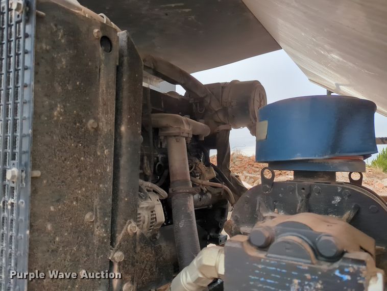 image for item OL9102 2011 UD Nissan 3300  pothole patcher truck