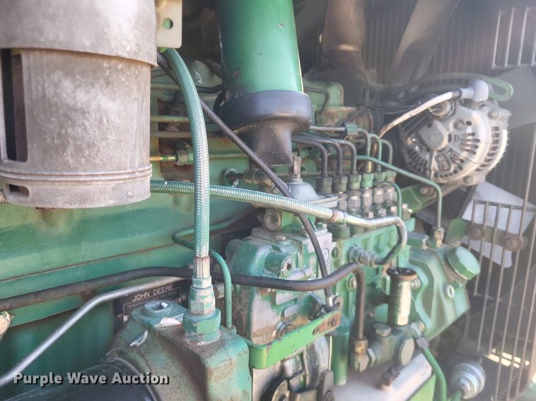 image for item DK1165 1990 John Deere 4955  MFWD tractor