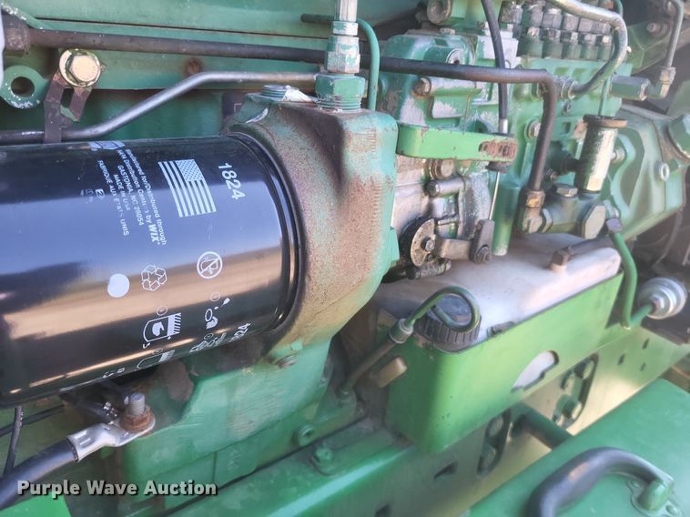 image for item DK1165 1990 John Deere 4955  MFWD tractor