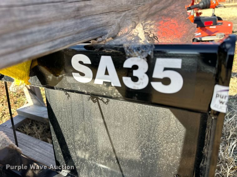 image for item OK9252 Kubota SA35  skid steer auger