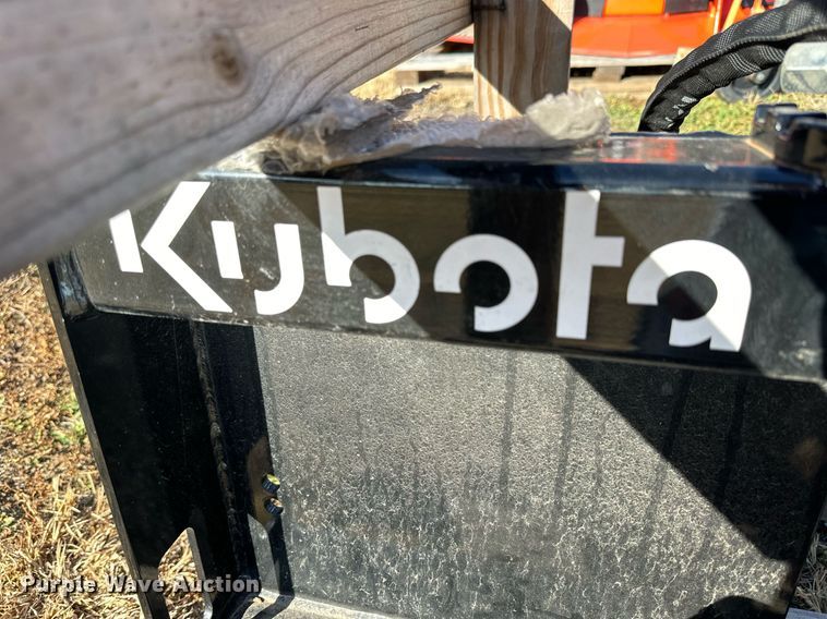 image for item OK9252 Kubota SA35  skid steer auger