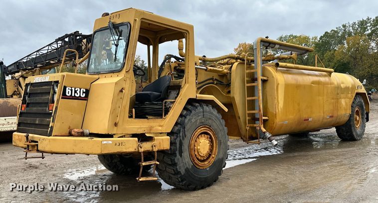 image for item JE9456 1997 Caterpillar 613C  water wagon