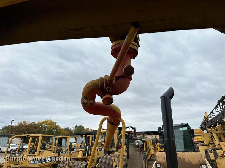 image for item JE9456 1997 Caterpillar 613C  water wagon