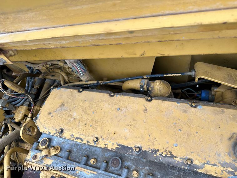 image for item JE9456 1997 Caterpillar 613C  water wagon