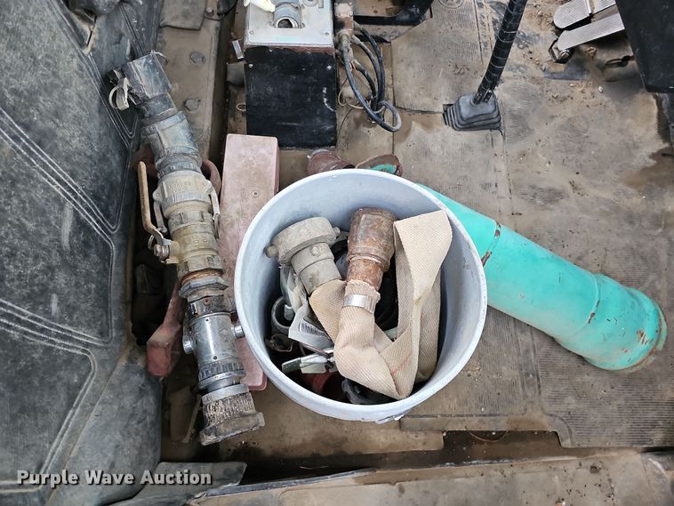 image for item IO9759 1990 Mack RD690S water truck