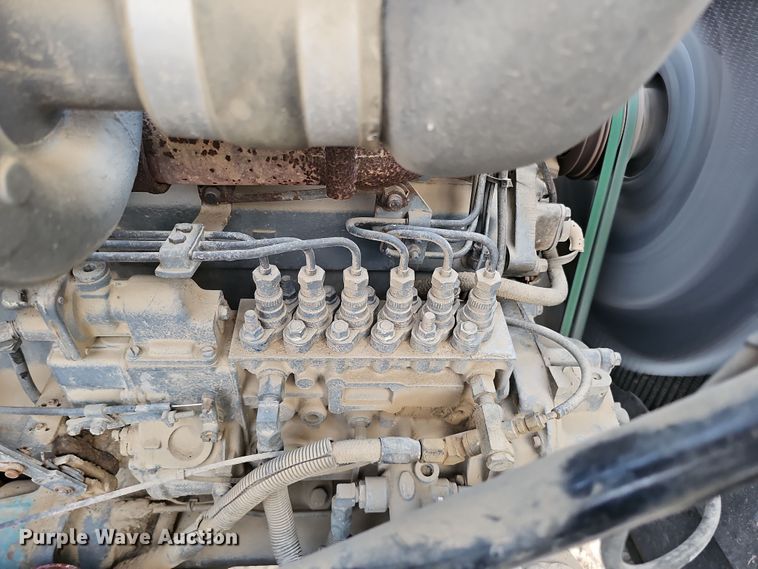 image for item IO9759 1990 Mack RD690S water truck