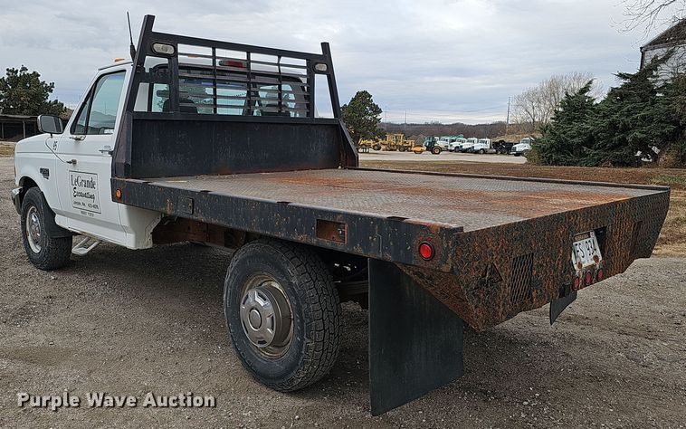 image for item IO9760 1995 Ford F350 XL flatbed pickup truck