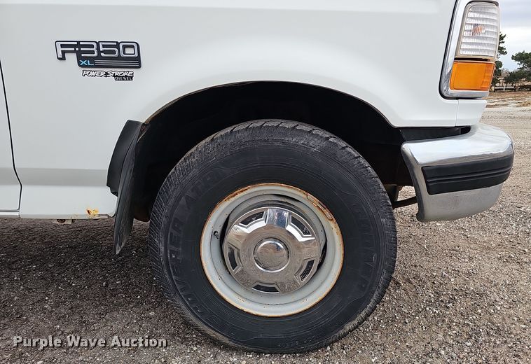 image for item IO9760 1995 Ford F350 XL flatbed pickup truck