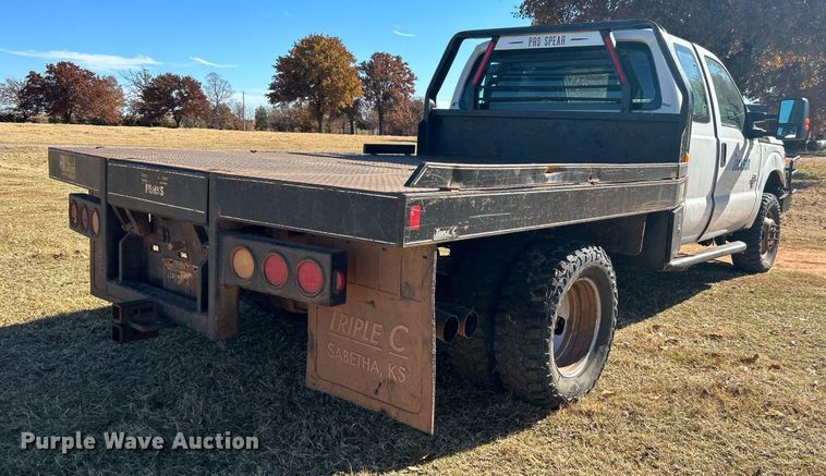 image for item DJ6486 2012 Ford F350 Super Duty XL  SuperCab bale bed pickup truck