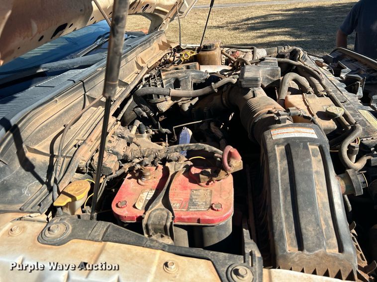 image for item DJ6486 2012 Ford F350 Super Duty XL  SuperCab bale bed pickup truck