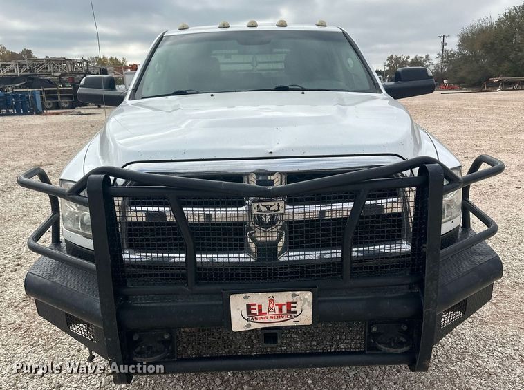 image for item IU9112 2016 Dodge Ram 3500HD  Crew Cab flatbed pickup truck