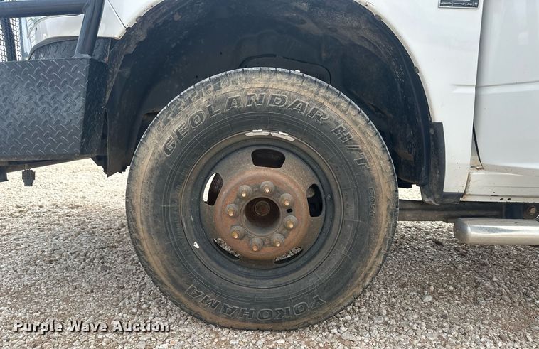 image for item IU9112 2016 Dodge Ram 3500HD  Crew Cab flatbed pickup truck