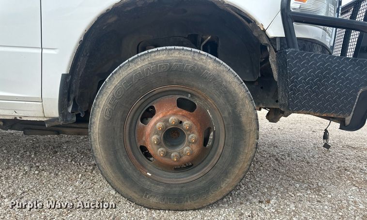 image for item IU9112 2016 Dodge Ram 3500HD  Crew Cab flatbed pickup truck