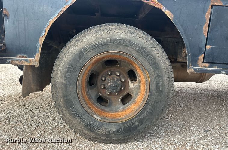 image for item IU9112 2016 Dodge Ram 3500HD  Crew Cab flatbed pickup truck