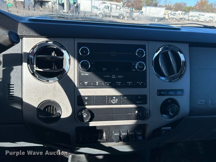 image for item KH9614 2015 Ford F650 Super Duty  flatbed truck