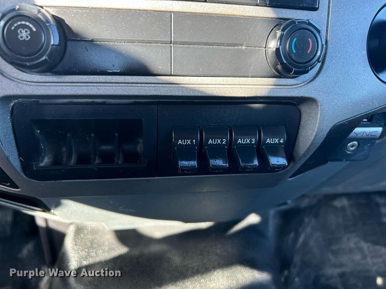 image for item KH9614 2015 Ford F650 Super Duty  flatbed truck