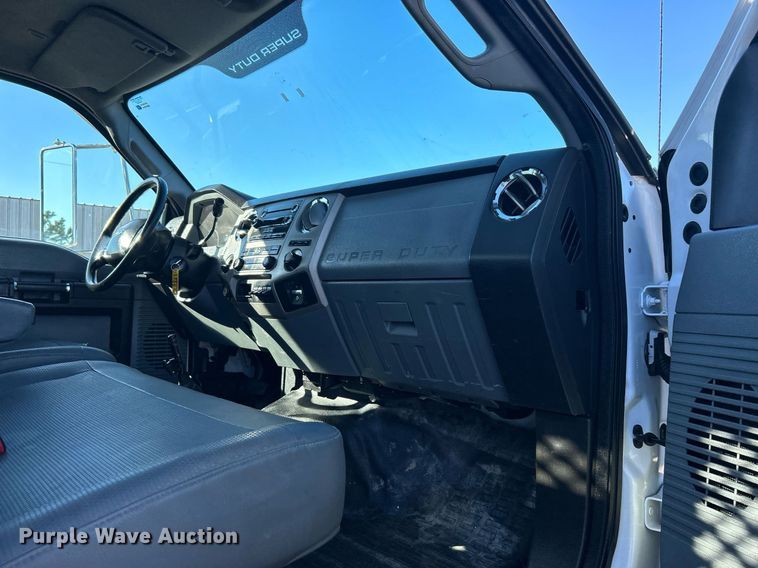 image for item KH9614 2015 Ford F650 Super Duty  flatbed truck