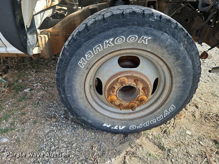 image for item LB9585 2005 GMC 3500  utility bed pickup truck