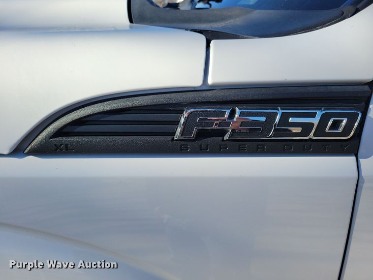 image for item LC9305 2013 Ford F350 Super Duty  SuperCab dump bed pickup truck