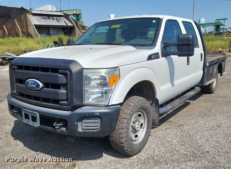 image for item LS9756 2011 Ford F250 Super Duty  Crew Cab flatbed pickup truck