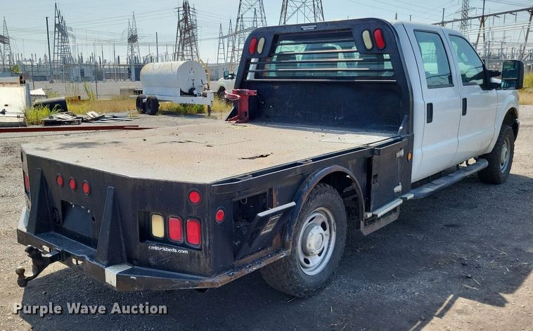 image for item LS9756 2011 Ford F250 Super Duty  Crew Cab flatbed pickup truck