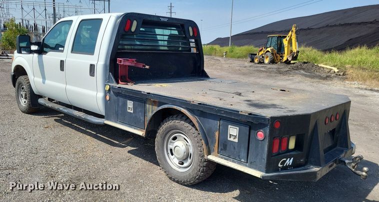 image for item LS9756 2011 Ford F250 Super Duty  Crew Cab flatbed pickup truck