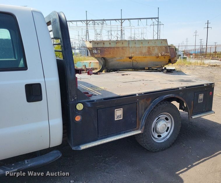 image for item LS9756 2011 Ford F250 Super Duty  Crew Cab flatbed pickup truck