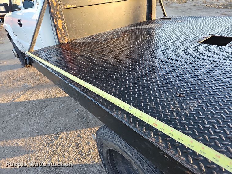 image for item MH9512 2001 GMC Sierra 3500  Ext. Cab flatbed pickup truck