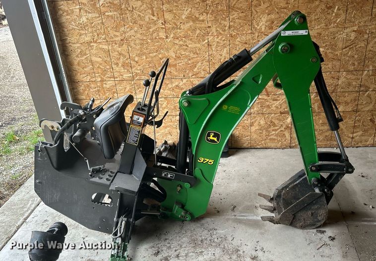 image for item MO9091 2010 John Deere 375  backhoe attachment