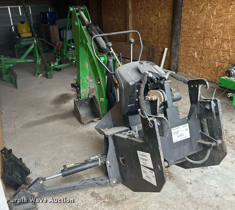 image for item MO9091 2010 John Deere 375  backhoe attachment