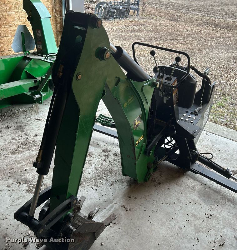 image for item MO9091 2010 John Deere 375  backhoe attachment
