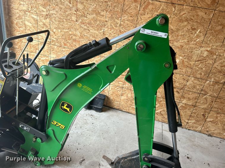 image for item MO9091 2010 John Deere 375  backhoe attachment