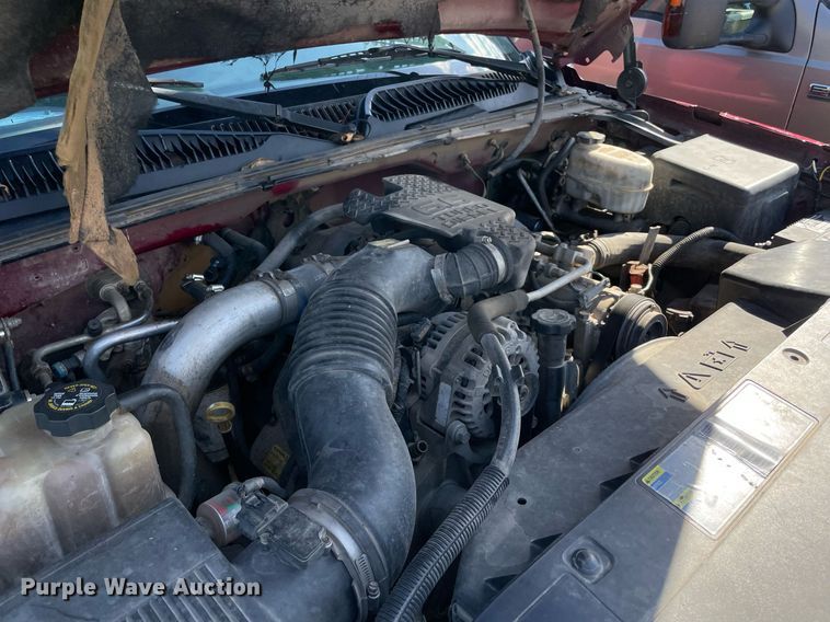 image for item NA9705 2004 Chevrolet Silverado 3500  Ext. Cab flatbed pickup truck