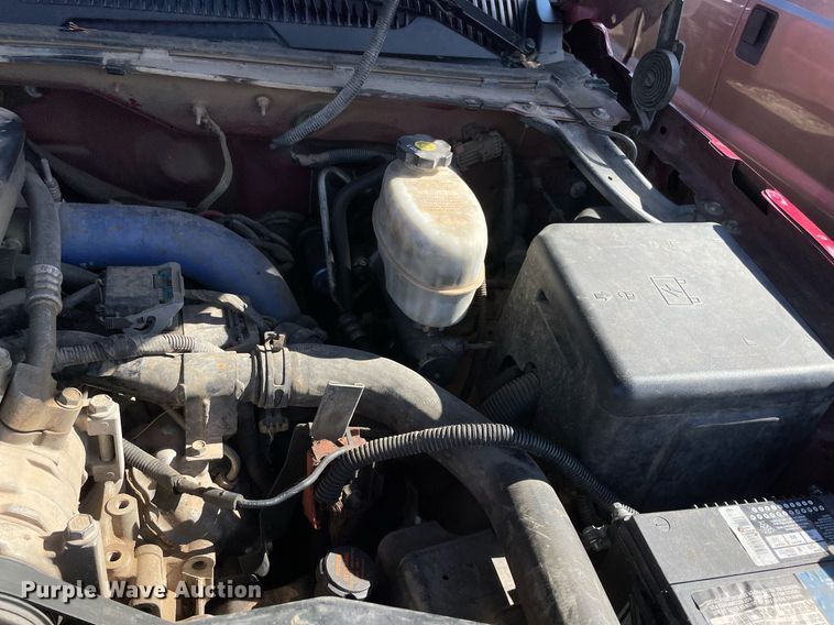 image for item NA9705 2004 Chevrolet Silverado 3500  Ext. Cab flatbed pickup truck