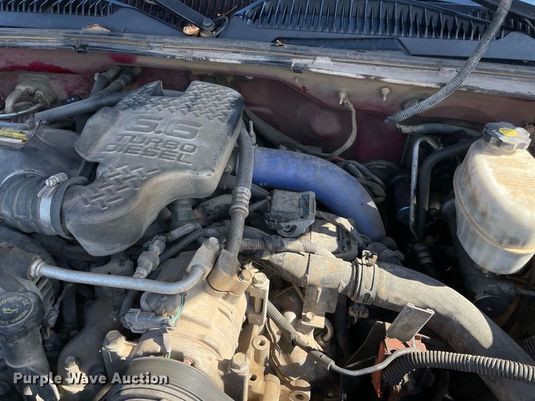 image for item NA9705 2004 Chevrolet Silverado 3500  Ext. Cab flatbed pickup truck