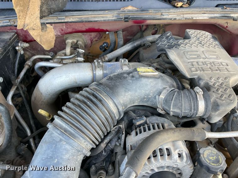 image for item NA9705 2004 Chevrolet Silverado 3500  Ext. Cab flatbed pickup truck