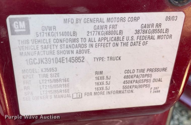 image for item NA9705 2004 Chevrolet Silverado 3500  Ext. Cab flatbed pickup truck