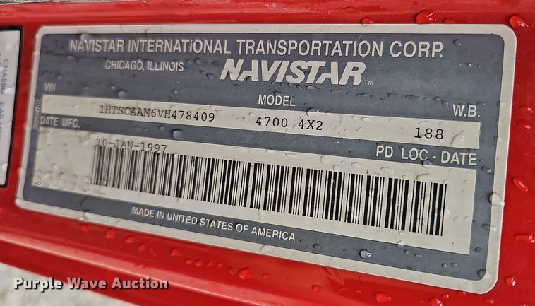 image for item NP9192 1997 International 4700  rollback truck